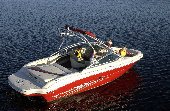 Family (mom, dad, son and daughter) on an anchored powerboat